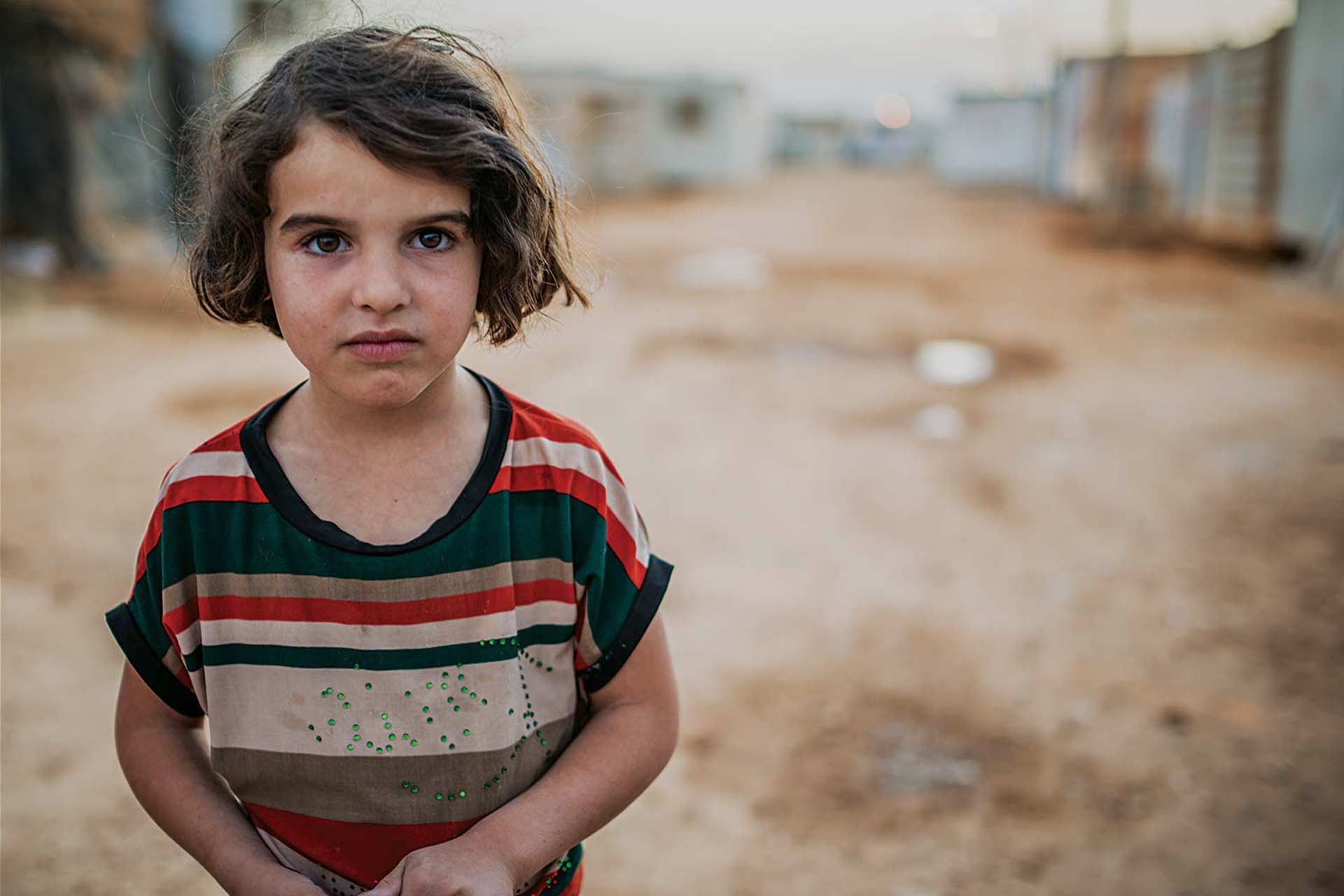 Сирийская девочка с голубыми глазами